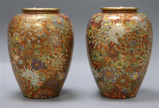 A pair of early 20th century Japanese Satsuma pottery vases H.18cm